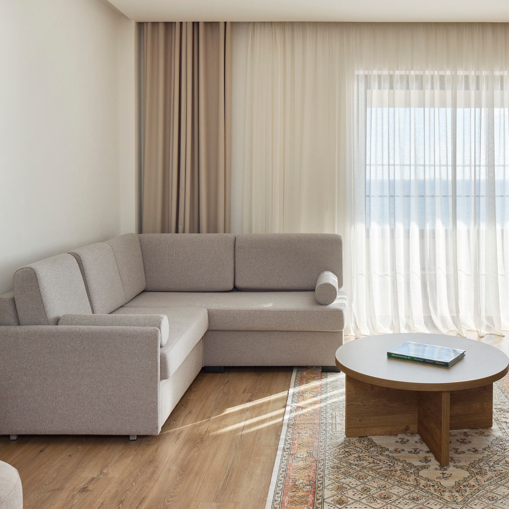 a living room with a couch and a coffee table