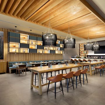 a large room with tables and chairs