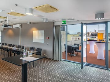 a room with tables and chairs