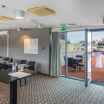 a room with tables and chairs