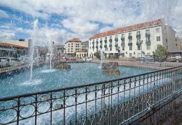 a water fountain in a city
