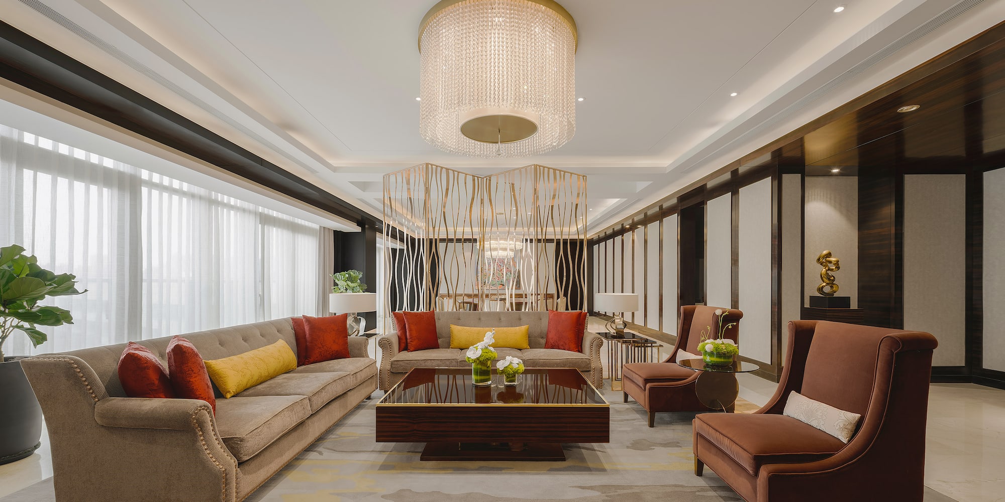 a room with couches and chairs