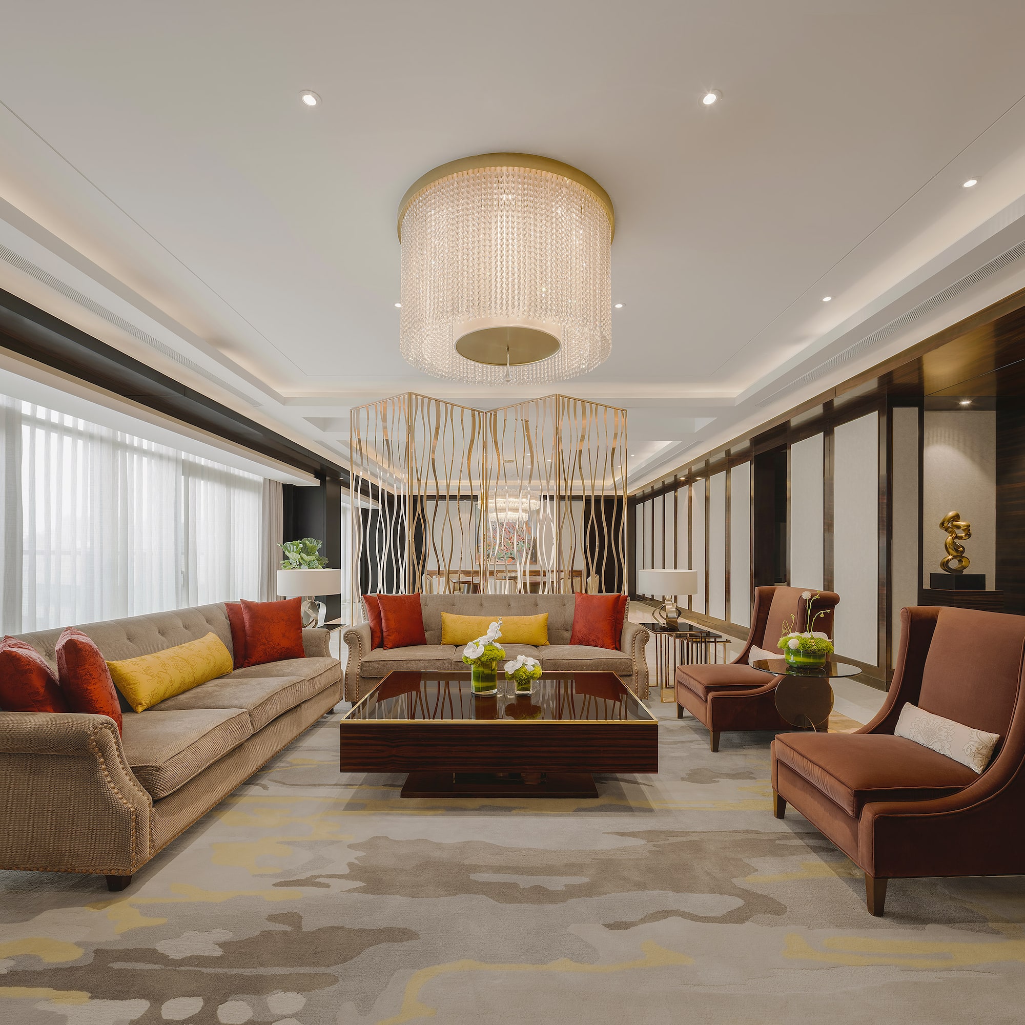 a room with couches and chairs