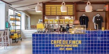 a blue tile counter with yellow text