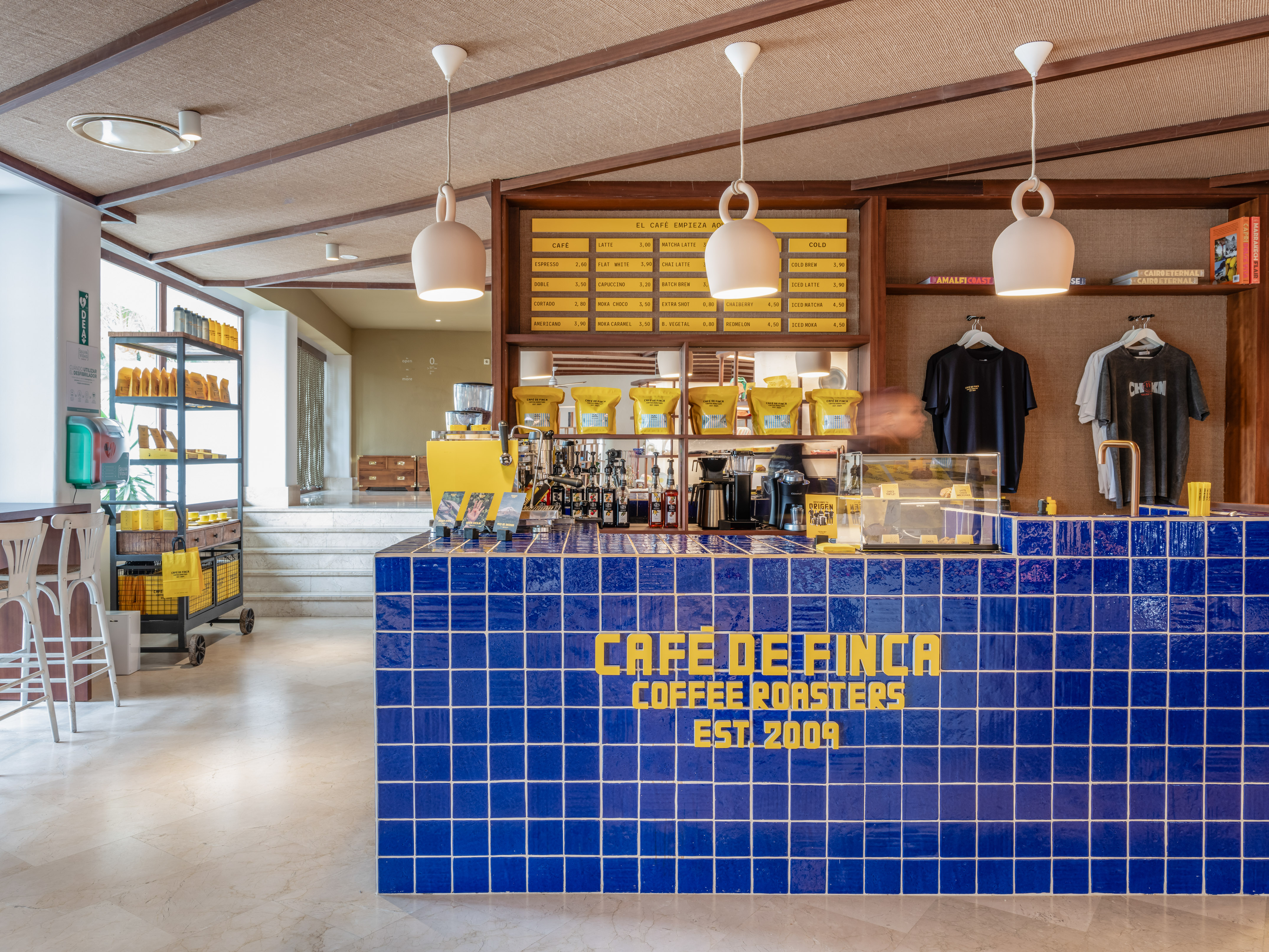 a blue tile counter with yellow text