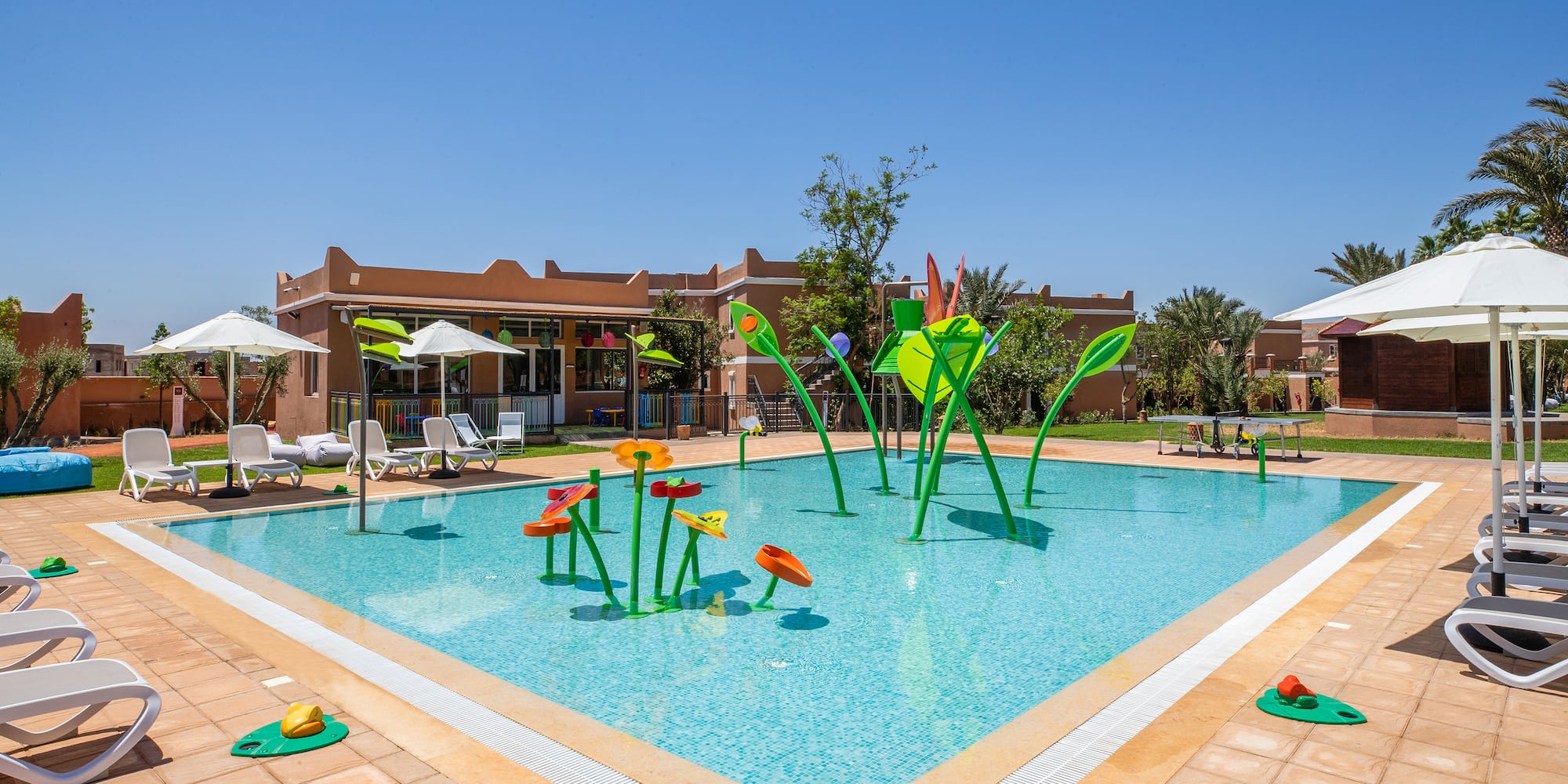 a pool with flowers in it