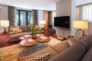 a living room with a television and a couch