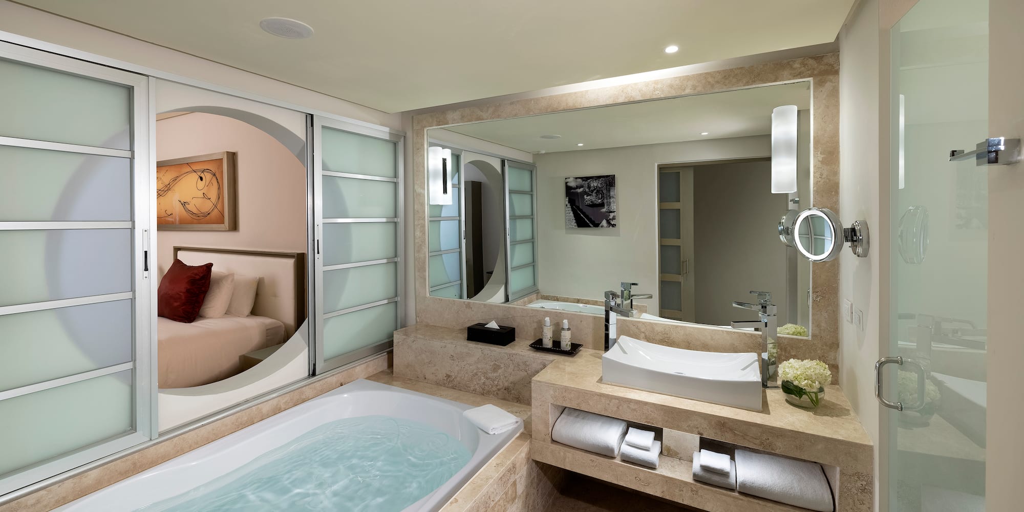 a bathroom with a tub and sink