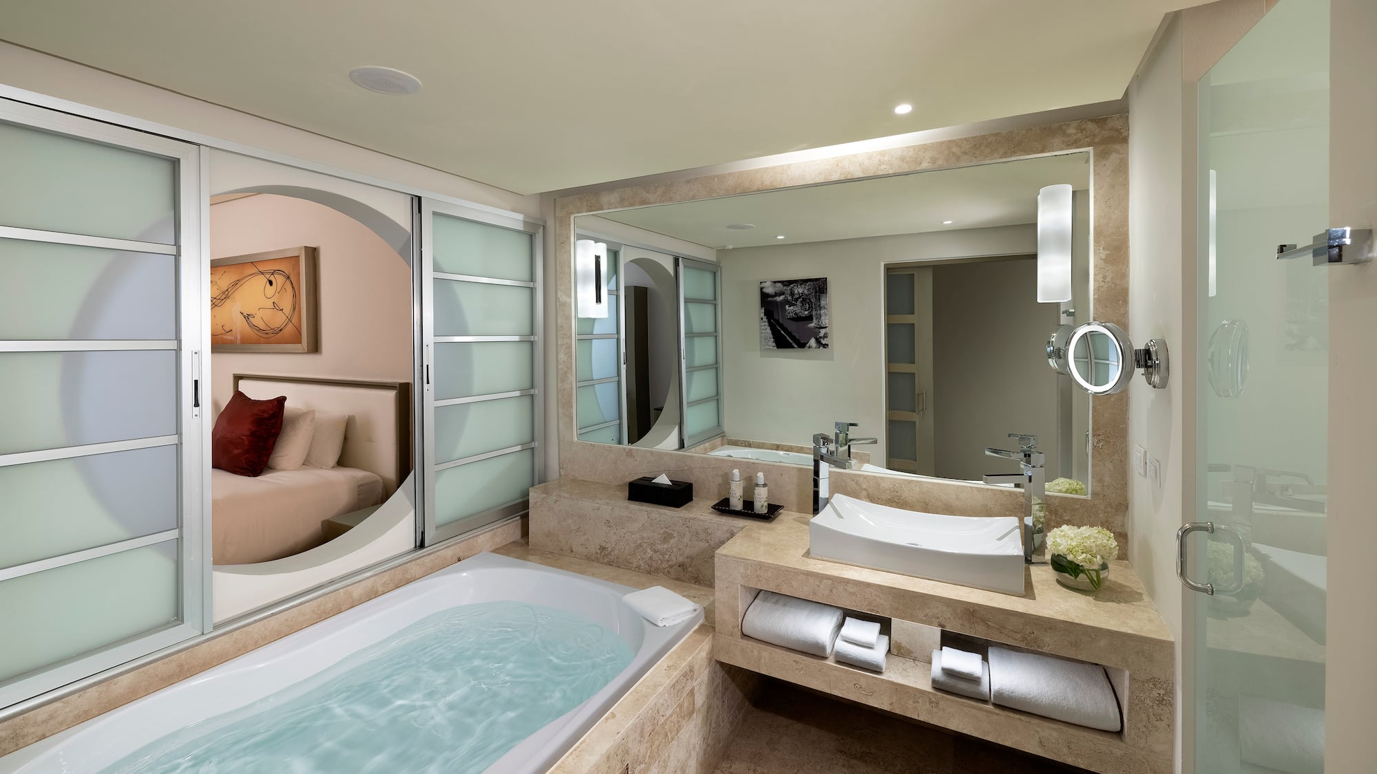 a bathroom with a bathtub and a mirror
