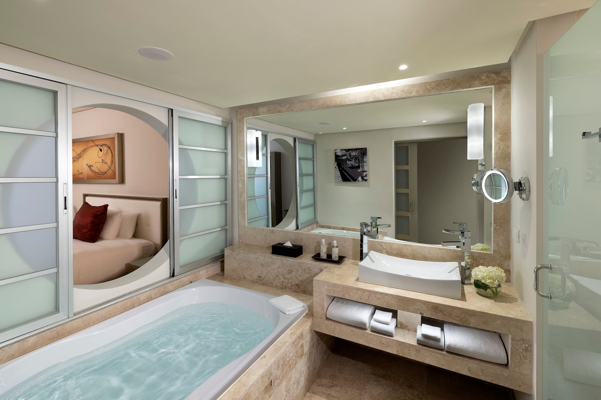 a bathroom with a bathtub and a mirror