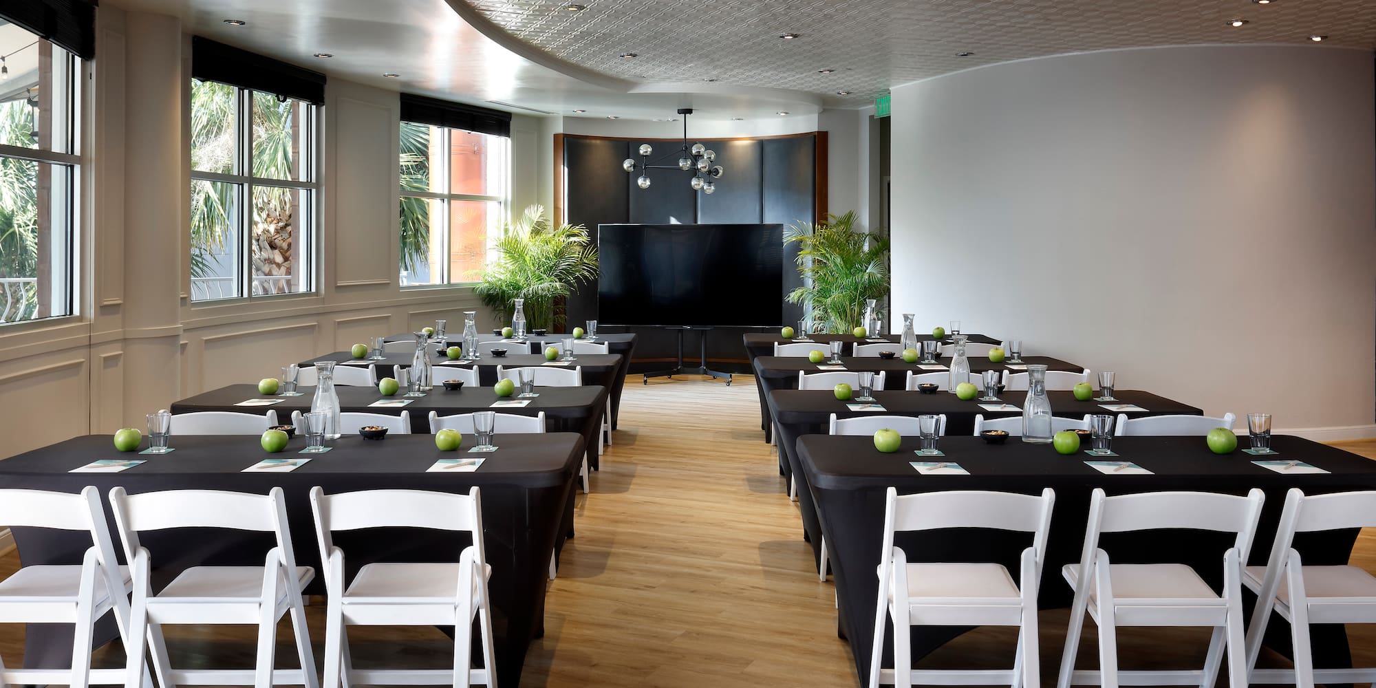 a room with tables and chairs