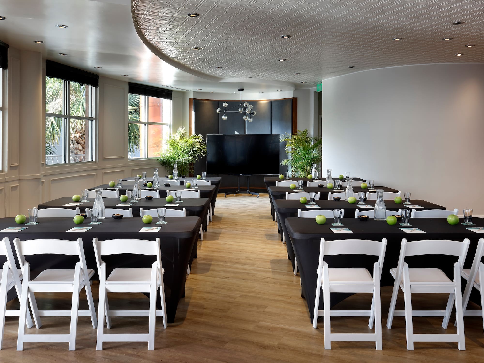 a room with tables and chairs