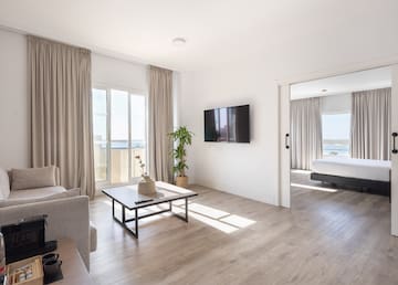 a room with a television and a bed