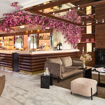 a room with a bar and a couch
