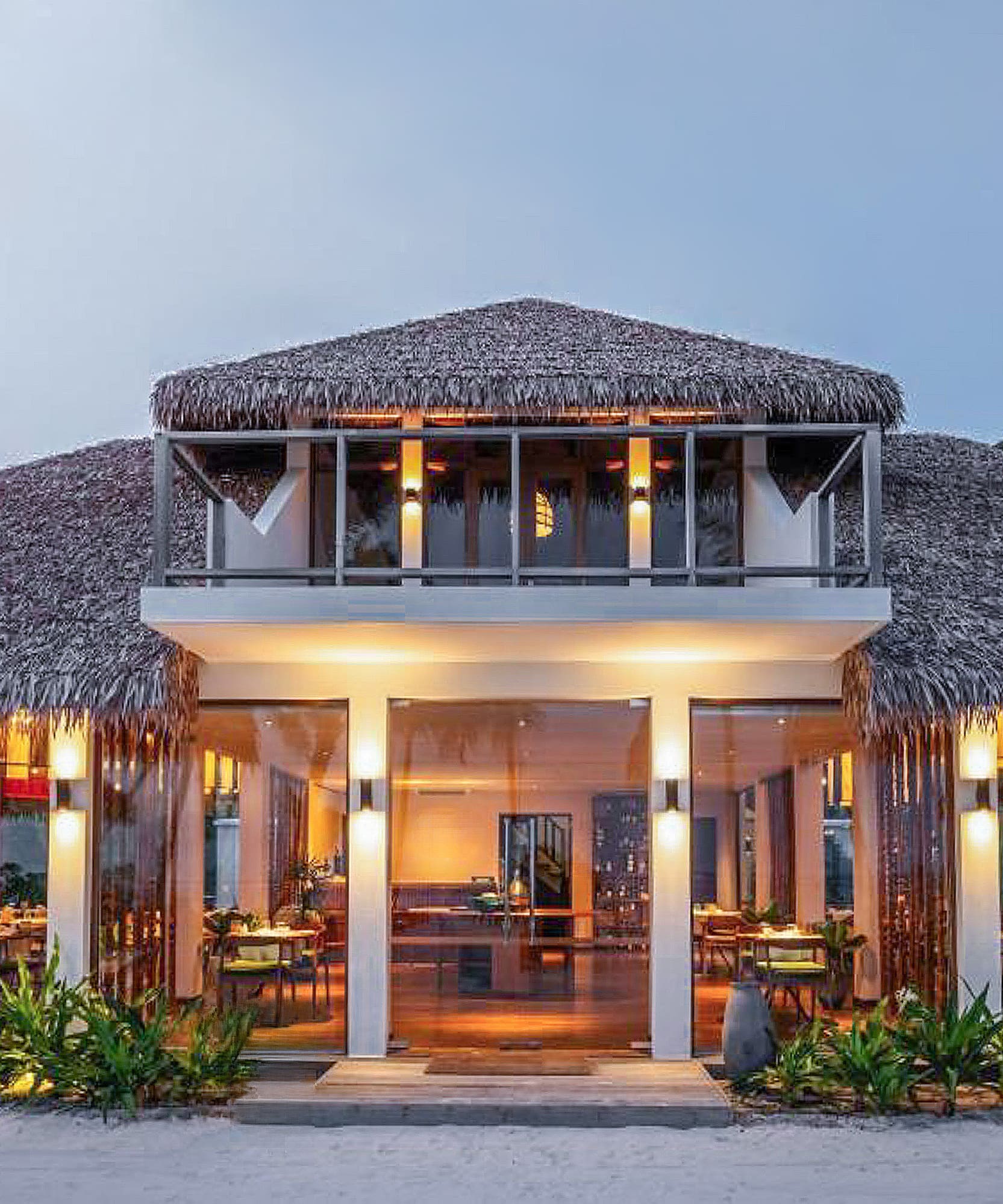 a building with a thatched roof