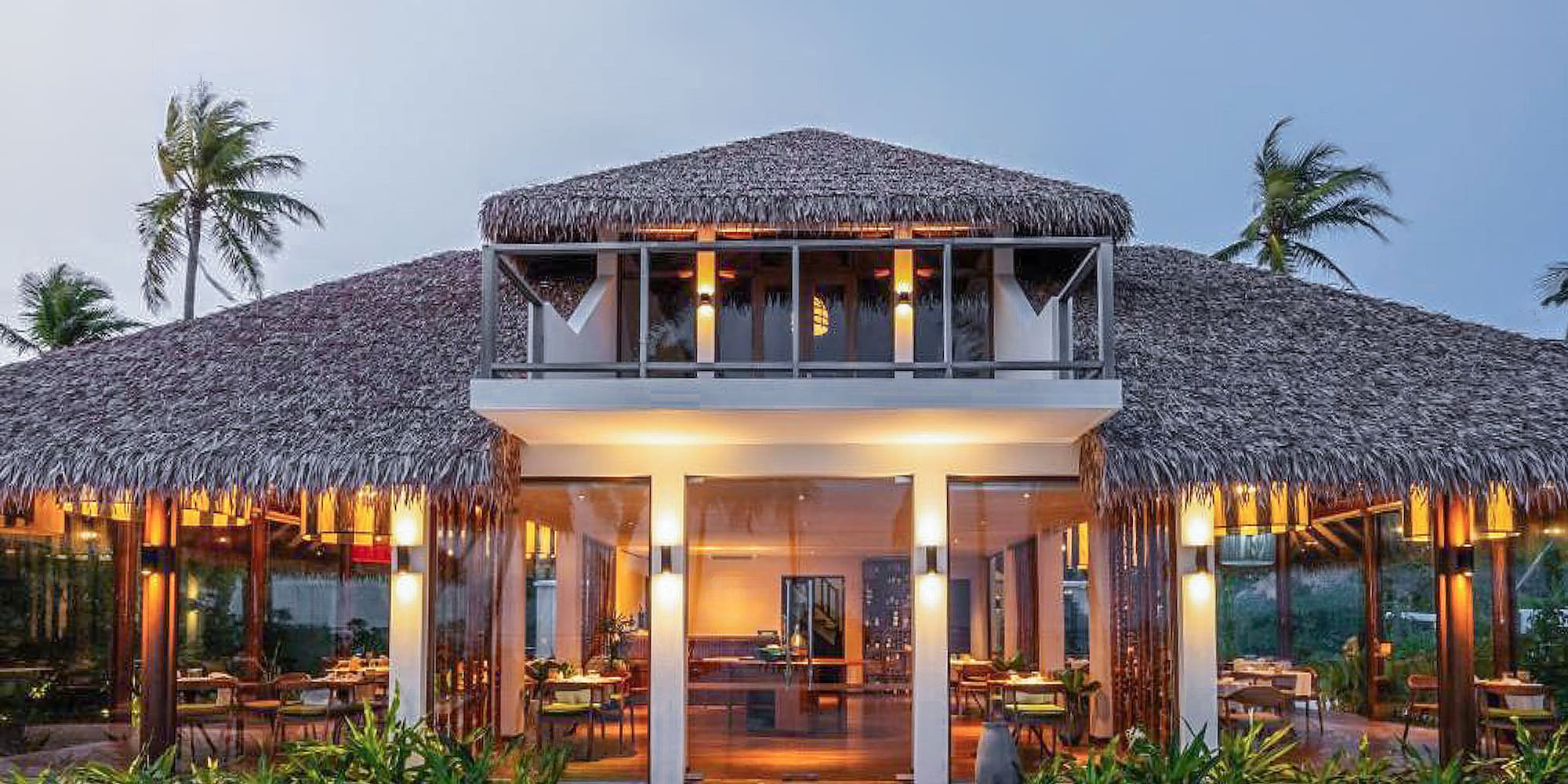 a building with a thatched roof