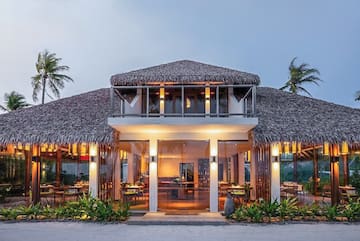 a building with a thatched roof