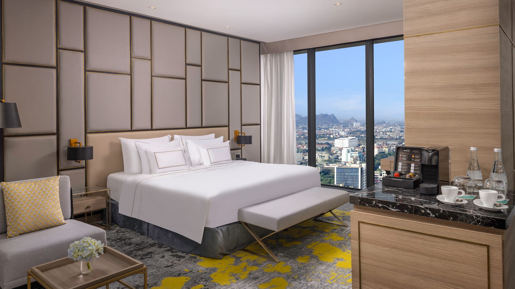 a room with a large bed and a large window