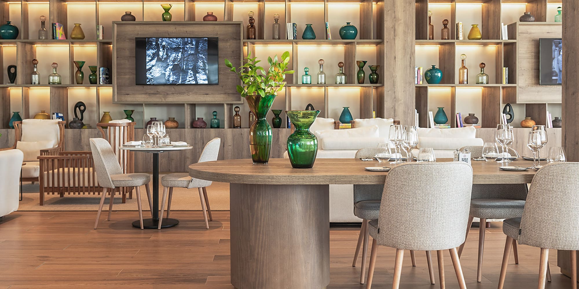 a room with a table and chairs