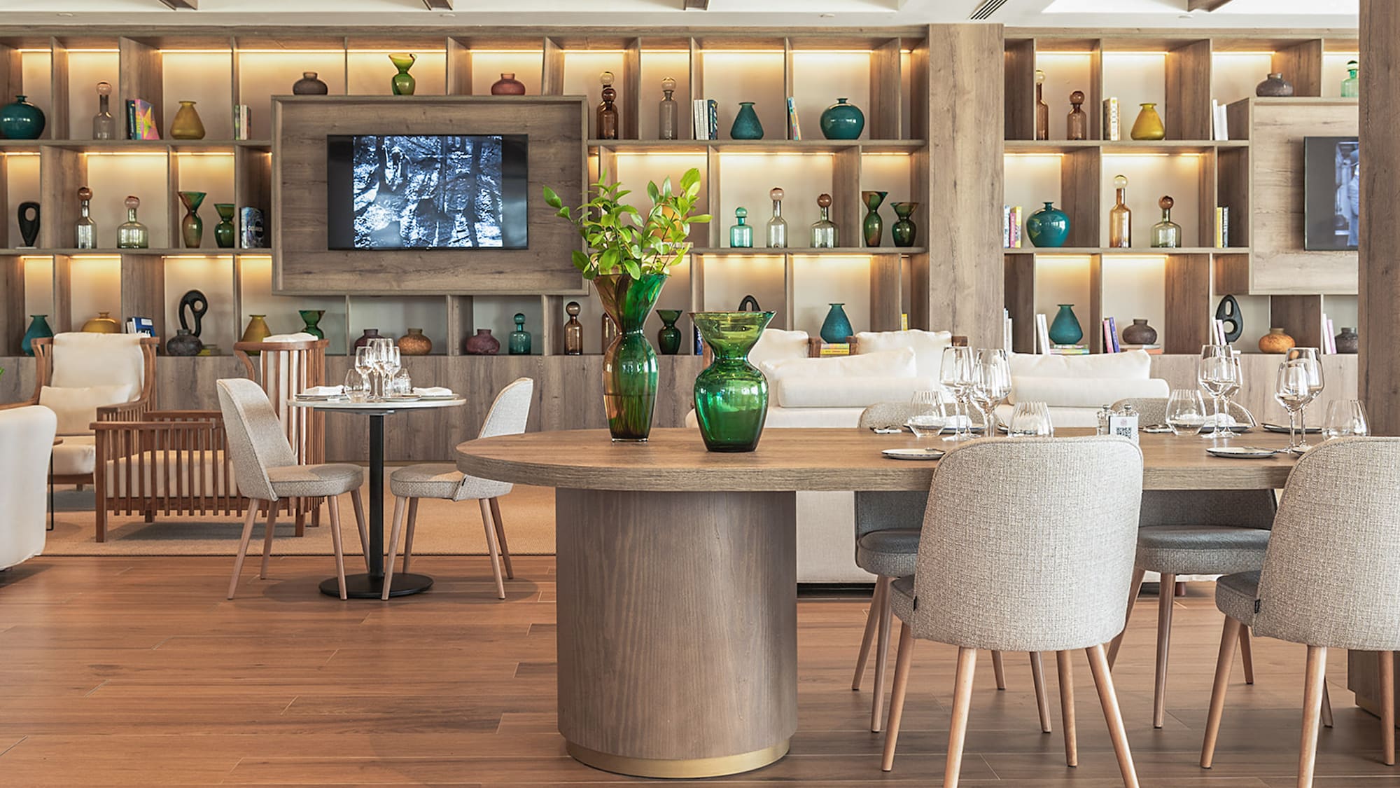 a room with a table and chairs