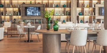 a room with a table and chairs