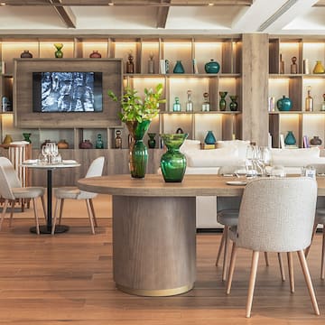 a room with a table and chairs