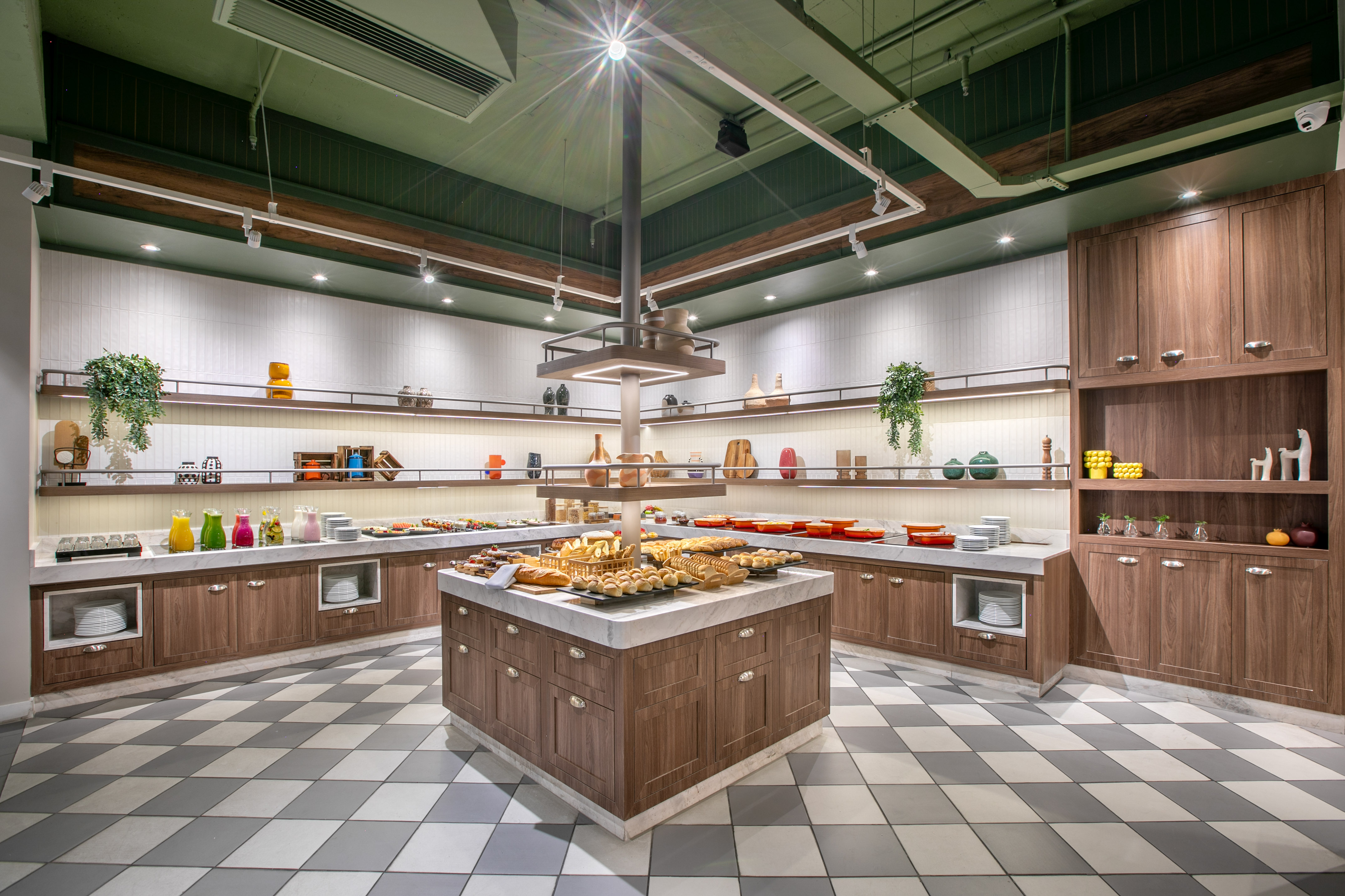 a large kitchen with food on shelves