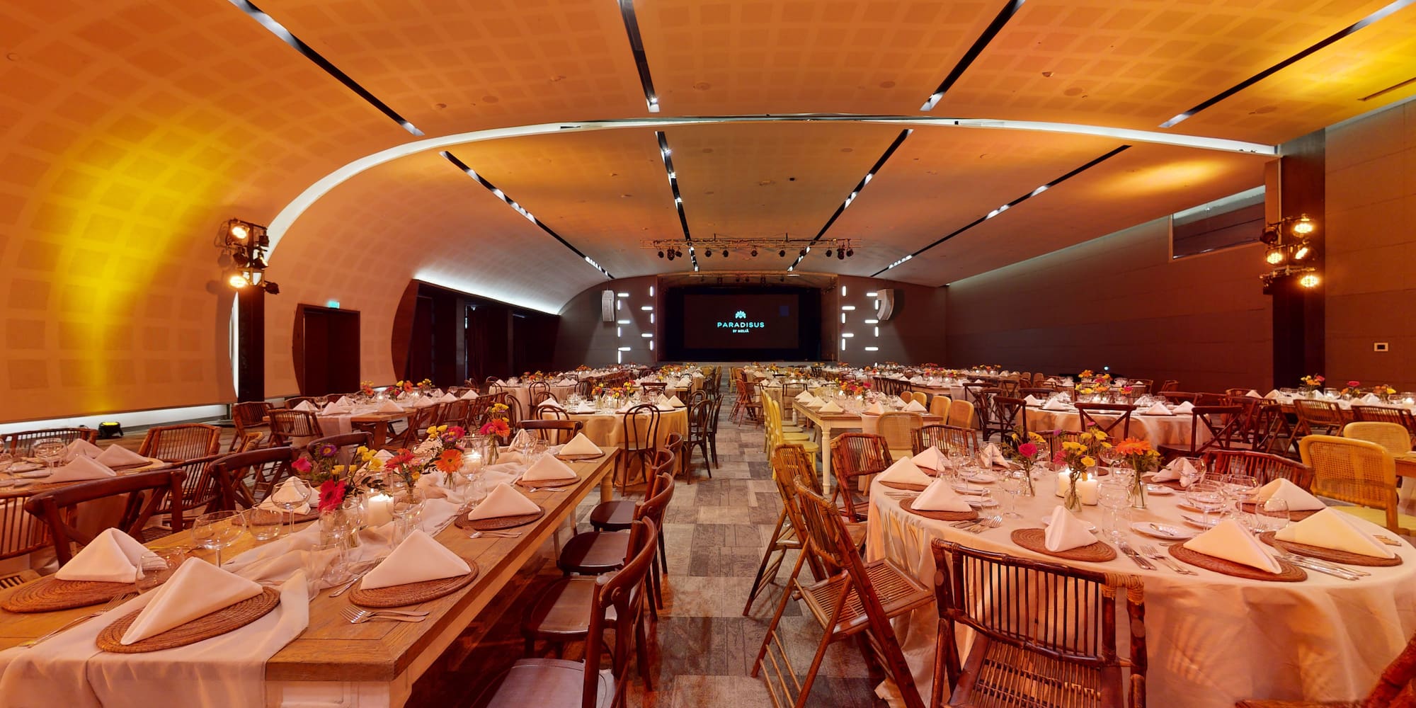 a large room with tables and chairs