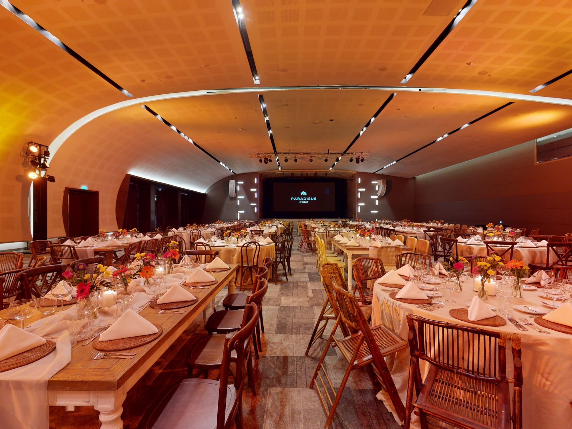 a large room with tables and chairs