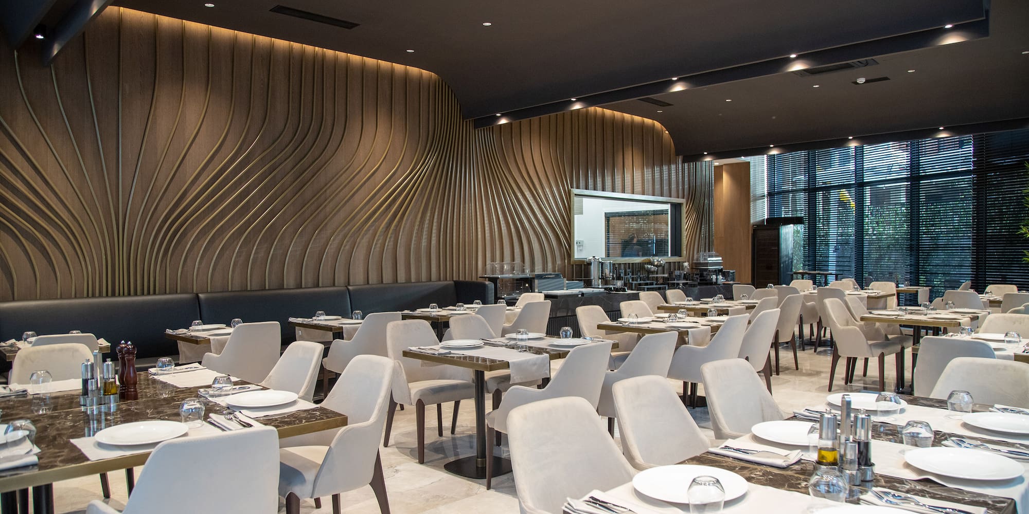 a restaurant with tables and chairs