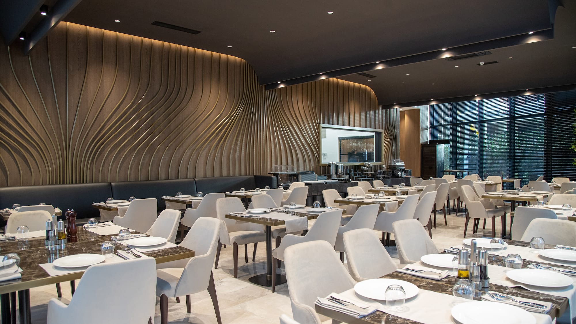 a restaurant with tables and chairs