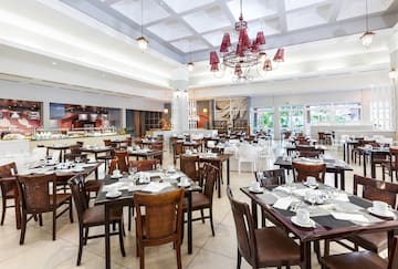 a large room with tables and chairs