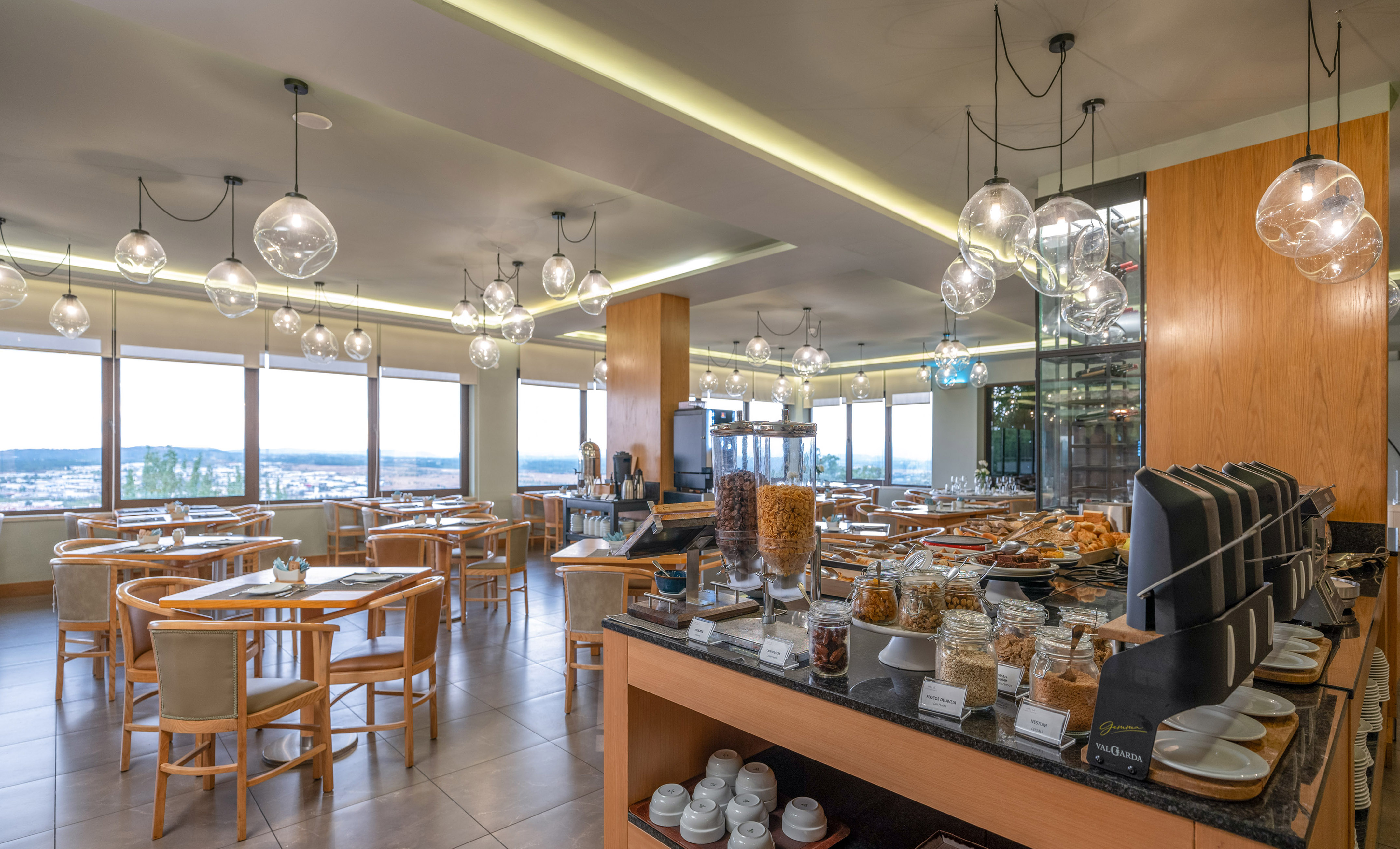 a restaurant with many tables and chairs