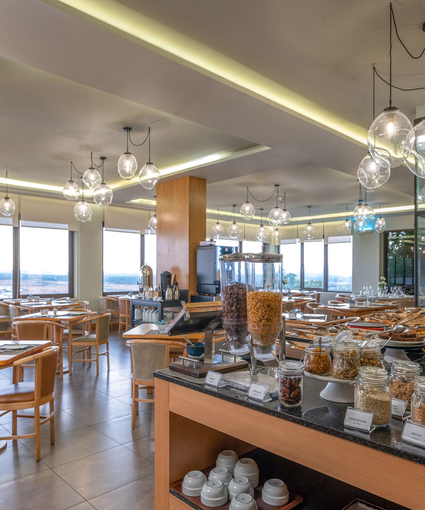 a restaurant with many tables and chairs