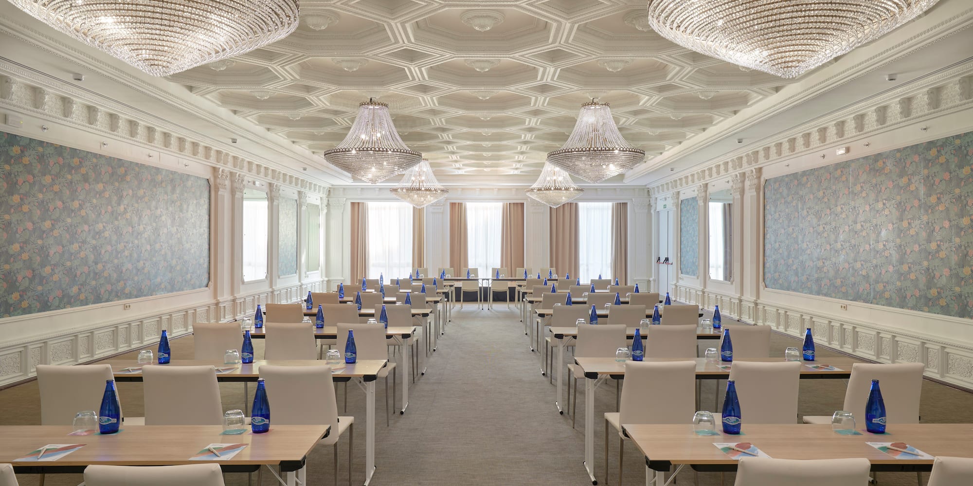 a room with tables and chairs