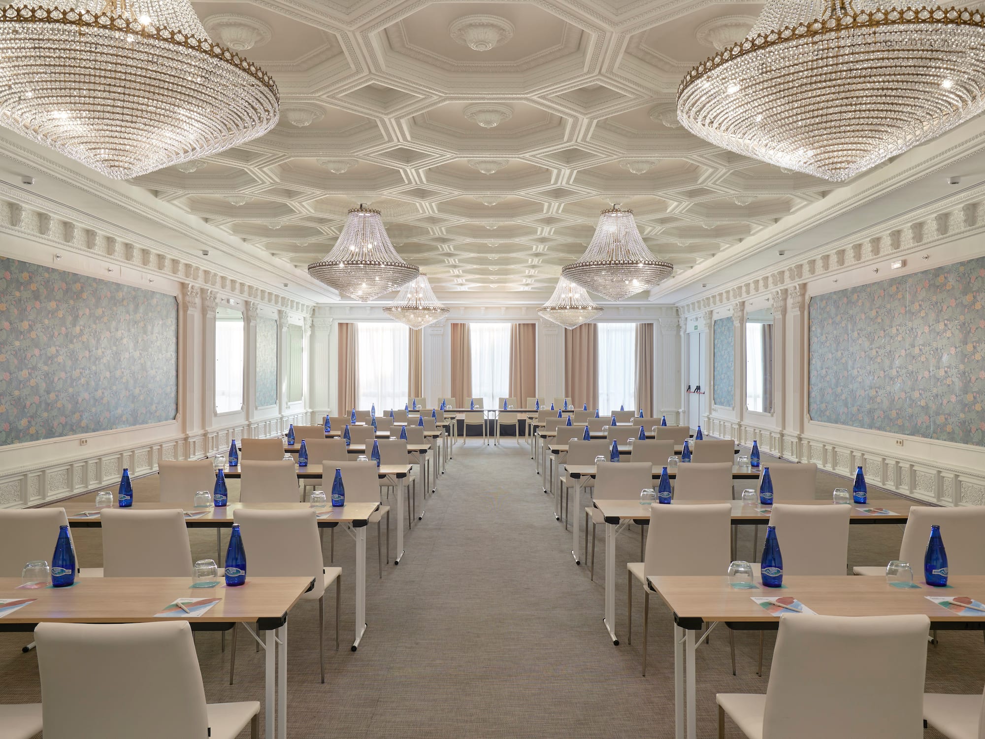 a room with tables and chairs