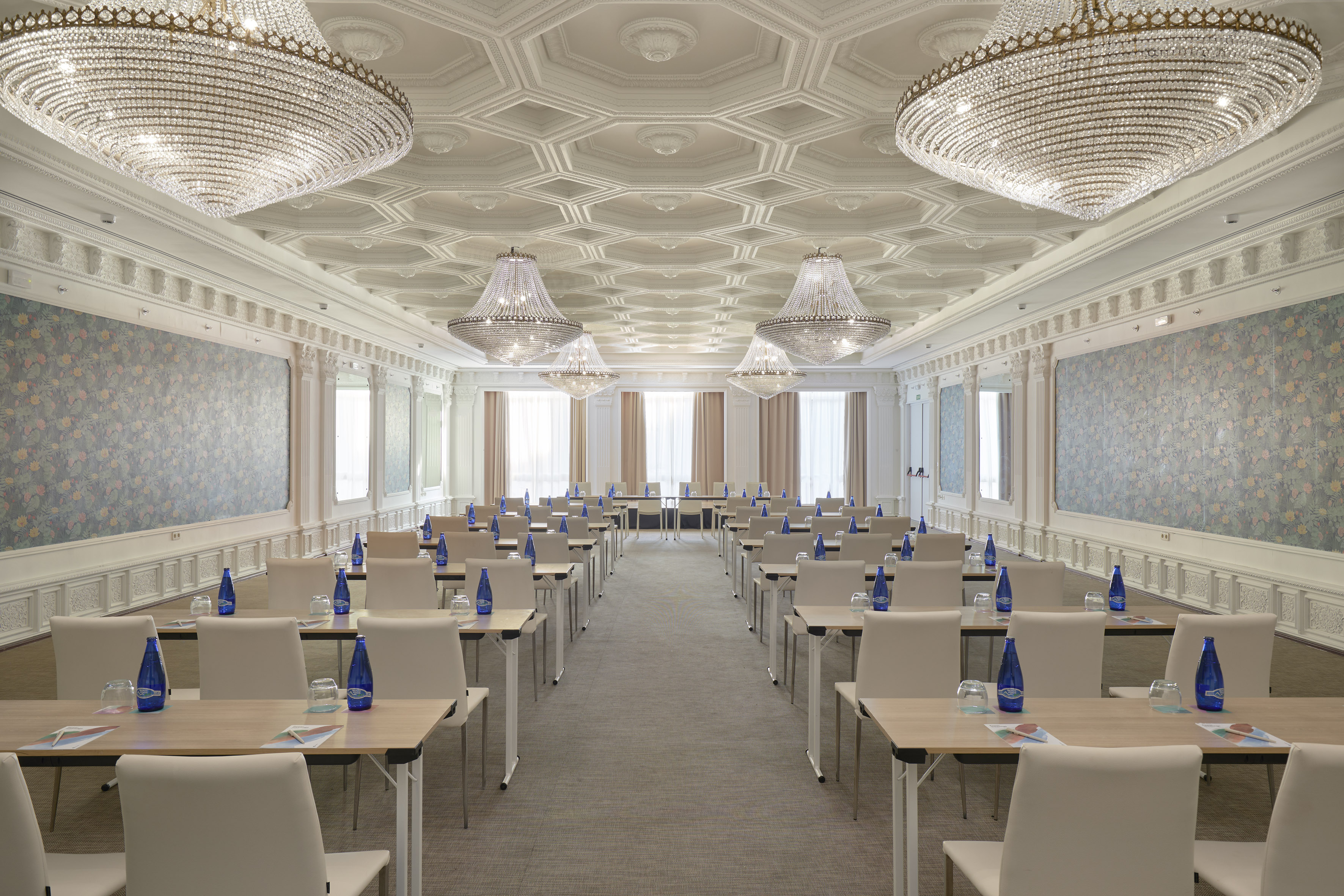 a room with tables and chairs