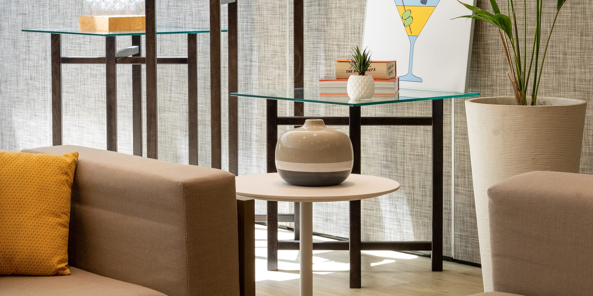 a room with couches and tables