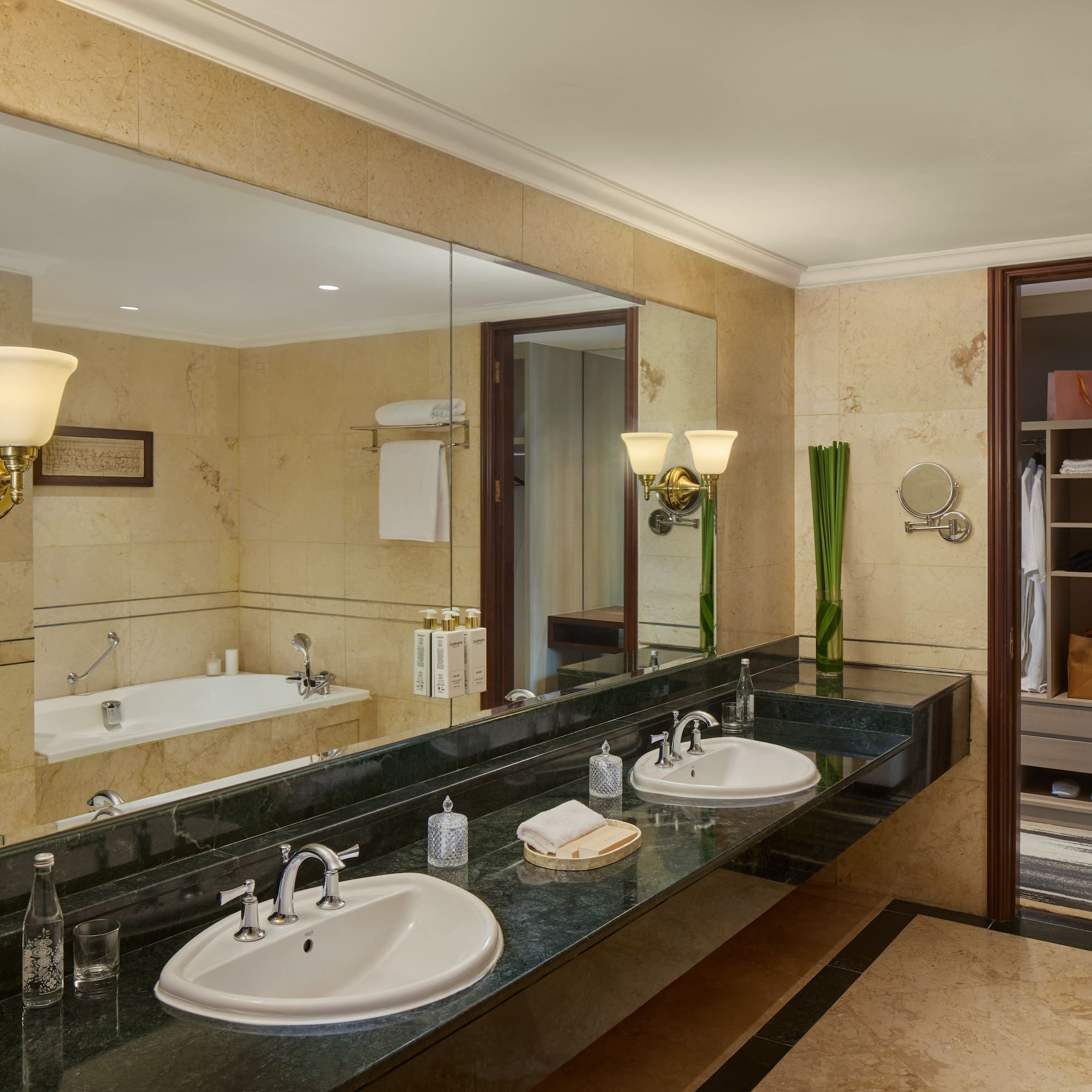 a bathroom with a large mirror and sinks