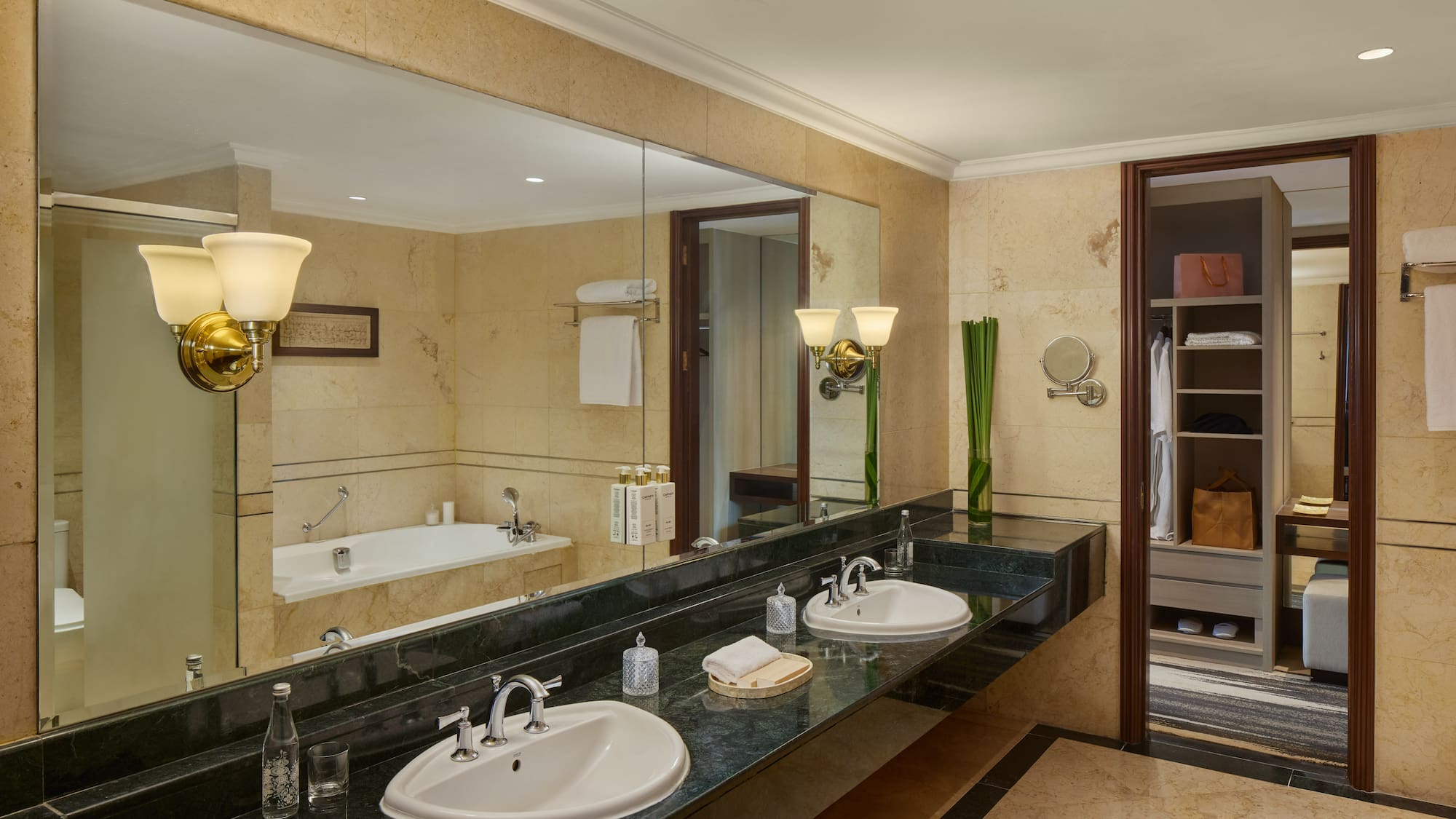 a bathroom with a large mirror and sinks