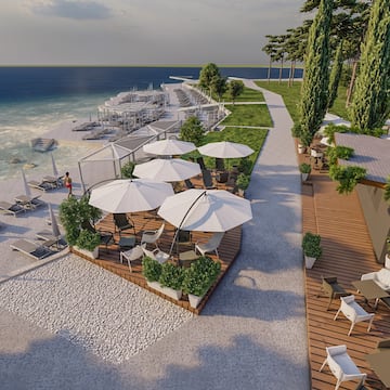 a beach with umbrellas and chairs