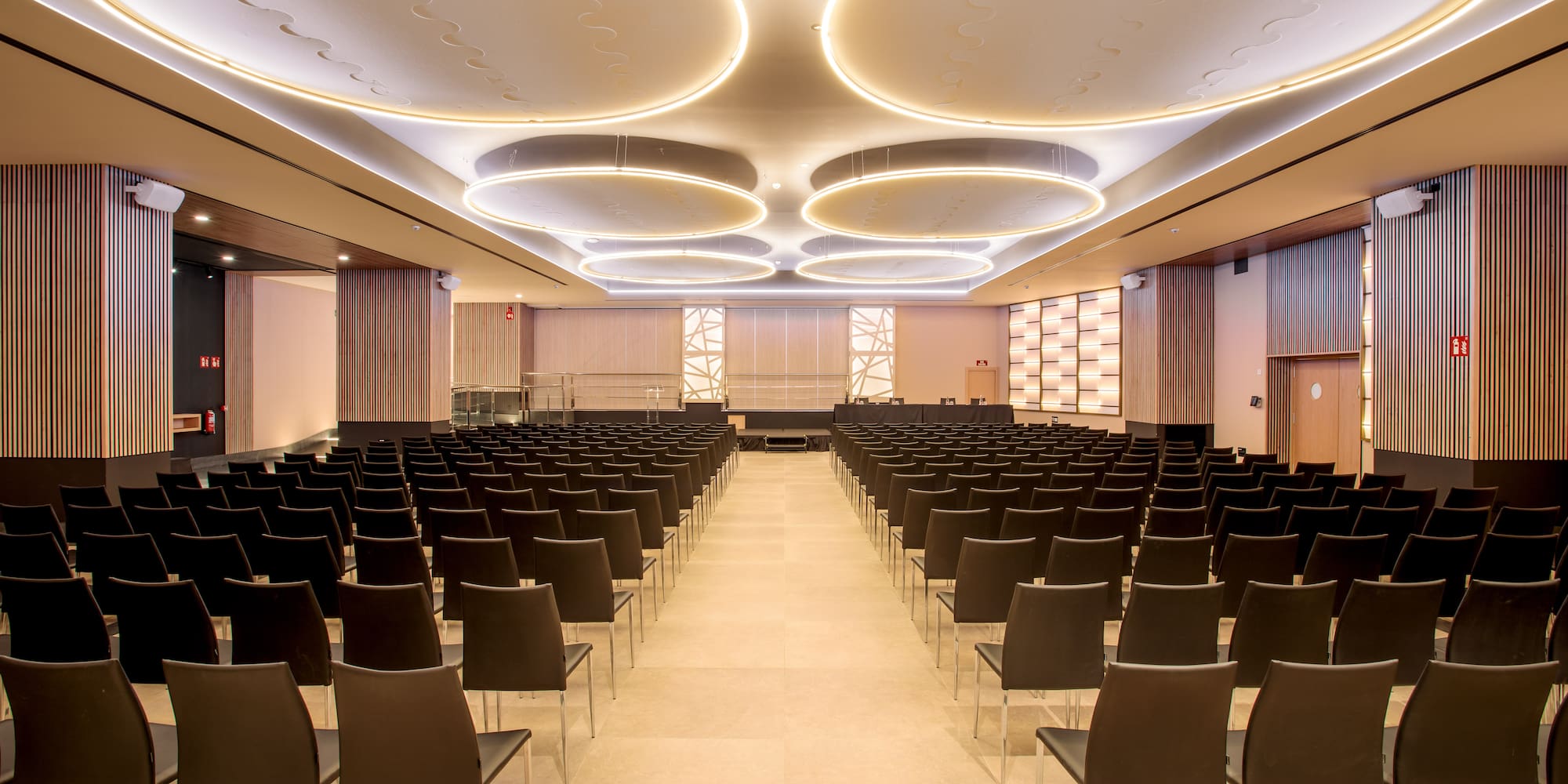 a large room with rows of chairs
