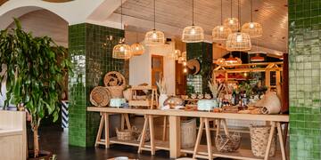 a room with a table and baskets