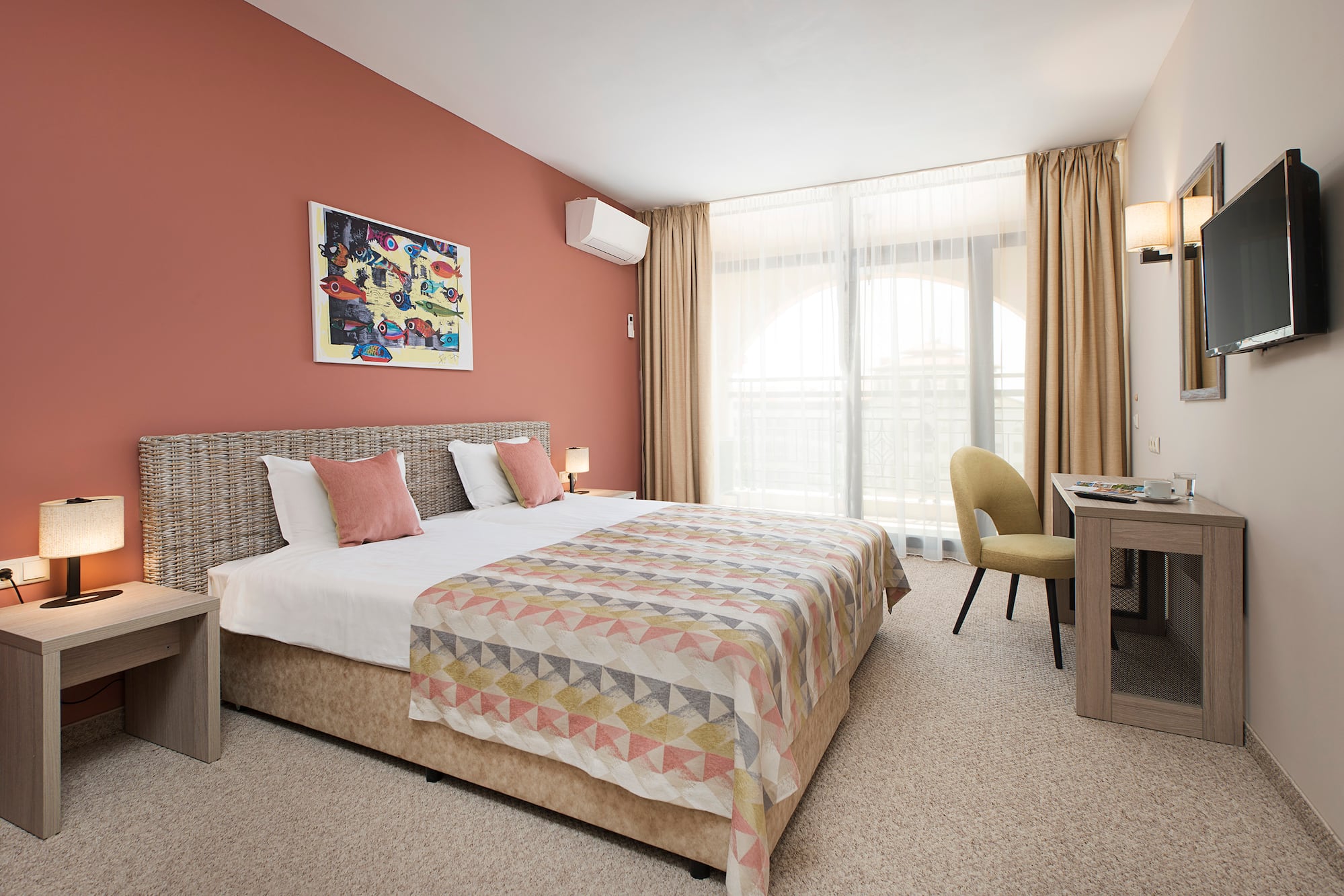 a bedroom with a bed and a desk