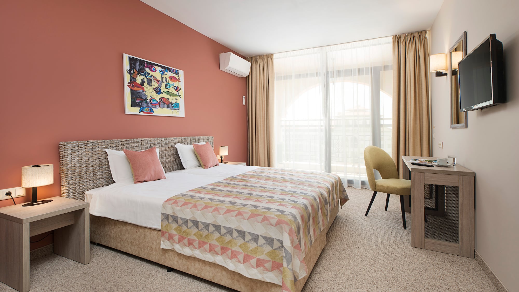 a bedroom with a bed and a desk