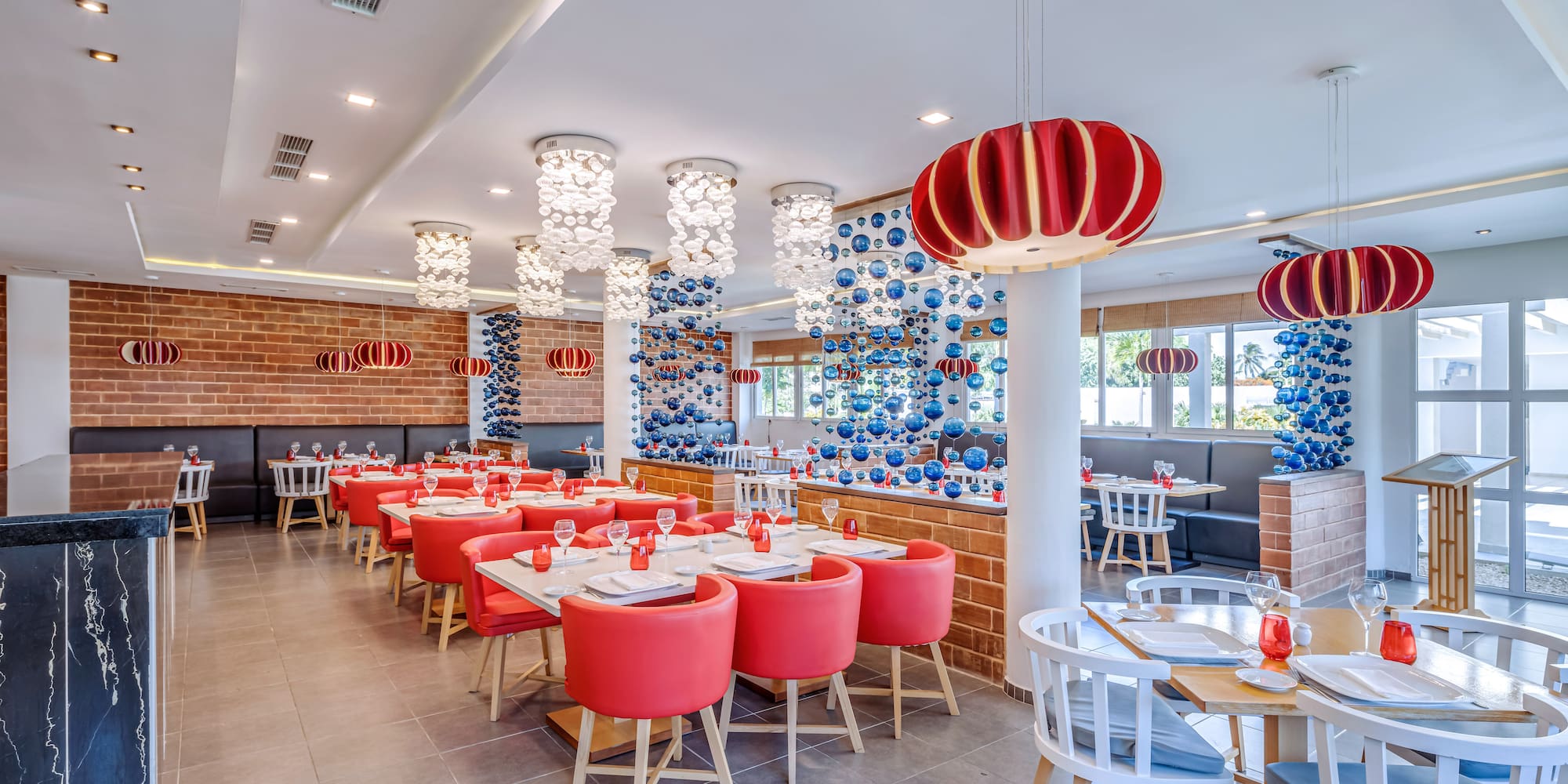 a room with tables and chairs