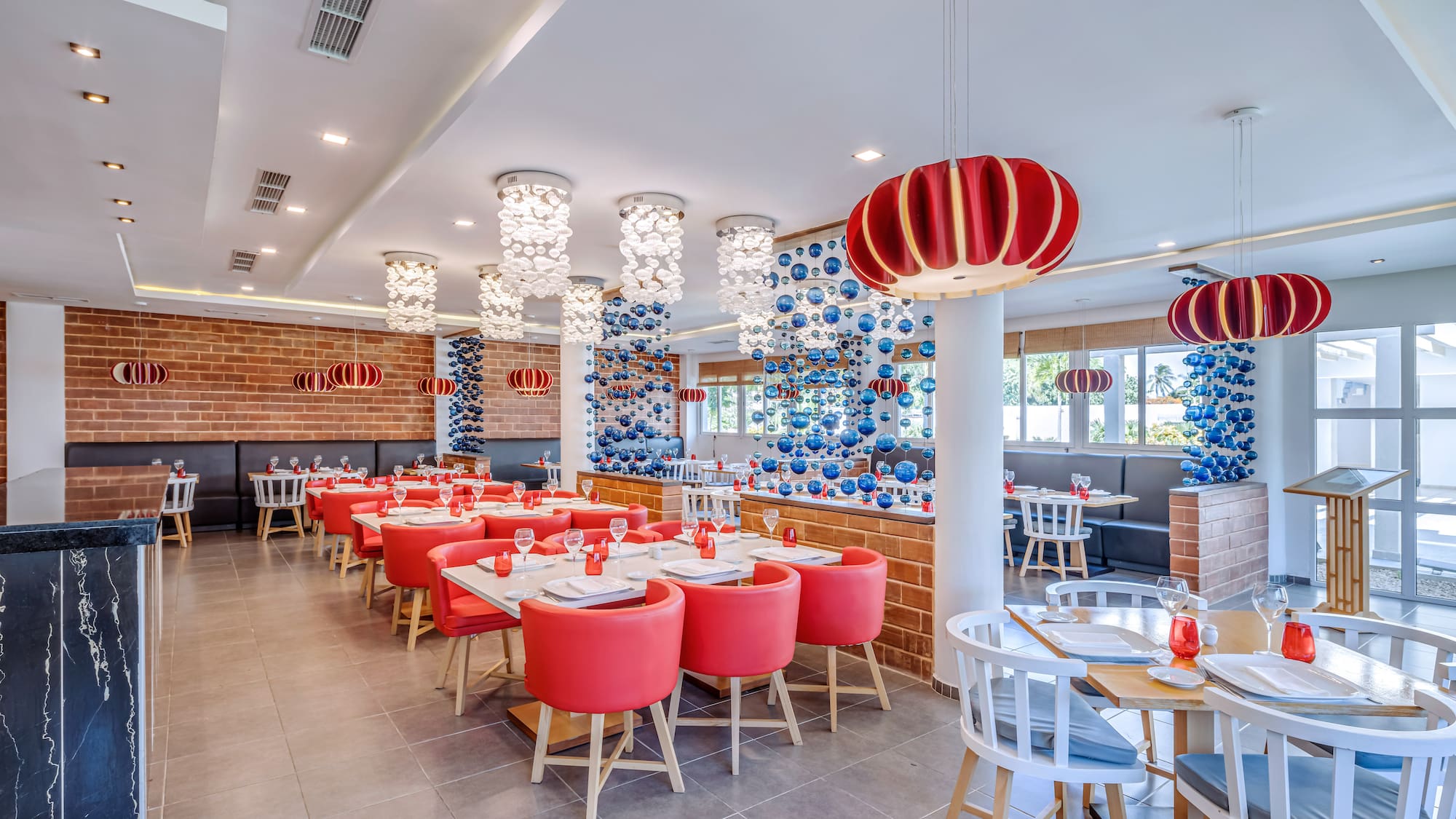 a room with tables and chairs