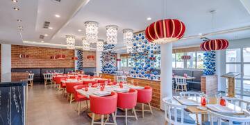 a room with tables and chairs