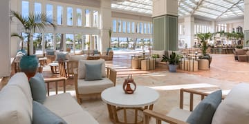 a room with chairs and tables