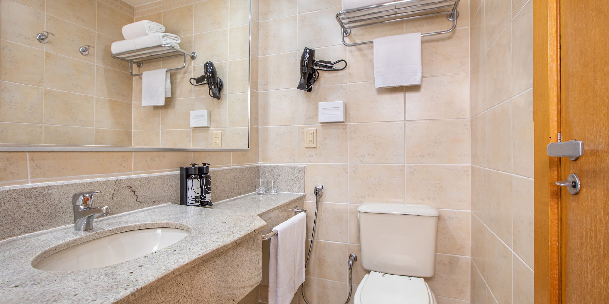 a bathroom with a sink and toilet